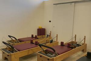Sala per pilates matwork e reformer