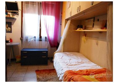armadio a ponte con letto singolo