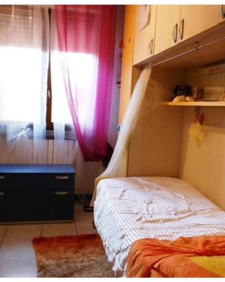 armadio a ponte con letto singolo