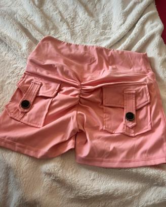 Short rosa vita alta con tasche