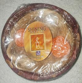 Ciotola in cera, con candele a forma di fiori