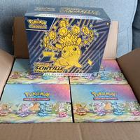 Mini tin evoluzioni prismatiche + etb scintille