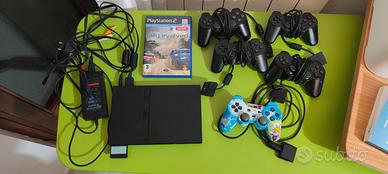 PS2 + 4 joysticks + 5 giochi