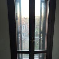 Infissi serramenti in legno e vetro camera e scuri