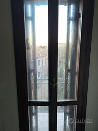 Infissi serramenti in legno e vetro camera e scuri