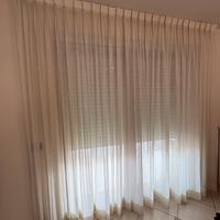 N. 2 tende per salone con relativi bastoni