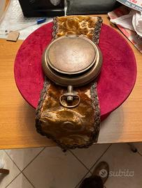 Vecchio posacenere da bracciolo