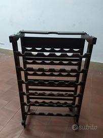 Porta bottiglie in legno.