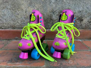 Pattini bambina quad fucsia e coccinelle tg 31