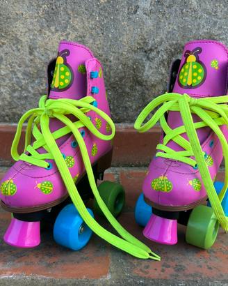 Pattini bambina quad fucsia e coccinelle tg 31