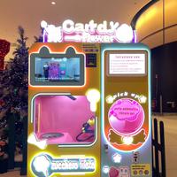 Distributore automatico di zucchero filato