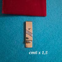 fermasoldi in metallo dorato