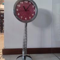 Orologio su base a molla
