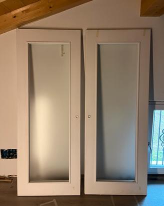 Doppia porta scorrevole in legno