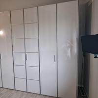 Armadio con tre ante a libro settimanale e 2 comod