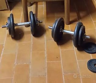 2 panche reclinabili, manubri, bilanciere e dischi