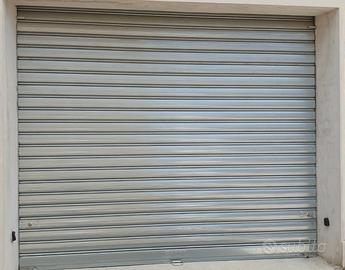 Seracinesca  avvolgibile con motorino in Metalo