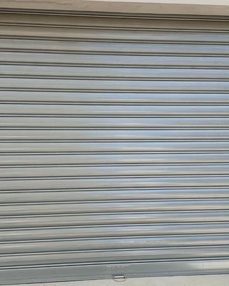 Seracinesca  avvolgibile con motorino in Metalo