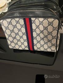 pochette Gucci Supreme