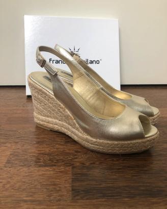 Décolleté con zeppa in corda oro