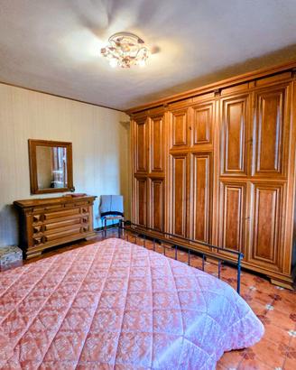 Camera da letto in stile rustico
