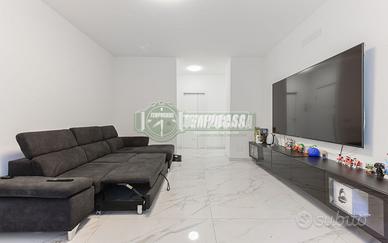 AMPIO QUADRILOCALE CON POSTO AUTO ASSEGNATO E CANT