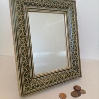 Cornice etnica con specchio