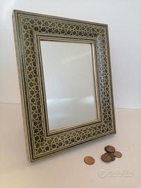 Cornice etnica con specchio
