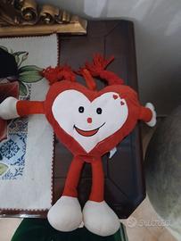 Simpatico Peluche a forma di Cuore Sorridente