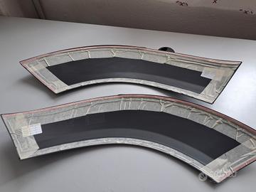 RIVESTIMENTO PASSARUOTA POST. SX+DX