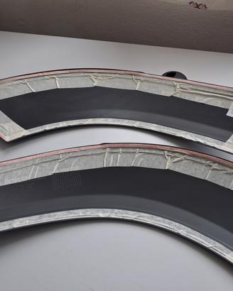 RIVESTIMENTO PASSARUOTA POST. SX+DX