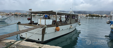 Barca adibita alla raccolta di Mitili