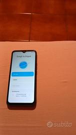 telefono cellulare xiaomi redmi 9 con cover