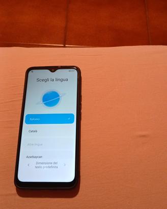 telefono cellulare xiaomi redmi 9 con cover