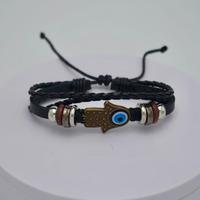 BRACCIALETTO MANO DI FATIMA IN CUOIO E CAUCCIU'