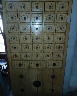 cassettiera da farmacia antica