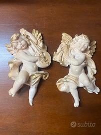 Coppia di angioletti decorativi da parete
