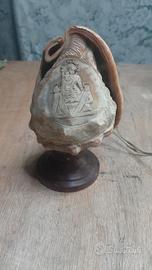 arte sacra conchiglia lampada cammeo incisa