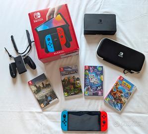 Nintendo Switch Oled + Custodia + 4 giochi 