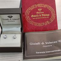 Orecchini in oro bianco con punto luce