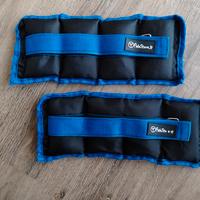 cavigliere e manubri pesetti allenamento pesi