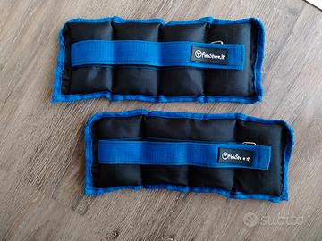 cavigliere e manubri pesetti allenamento pesi