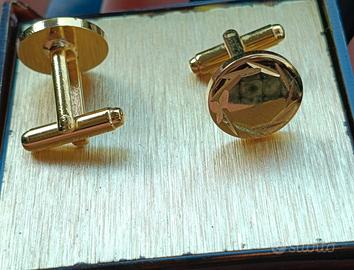 Bigiotteria: coppia di gemelli metallo color oro 