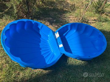 Conchiglia per piscina e sabbia