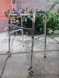 Deambulatore acciaio con 2 ruote a 360°