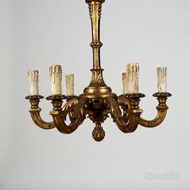 Lampadario ligneo intagliato a mano