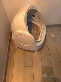 Lettiera auto- pulente