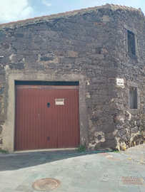 Garage con area adiacente edificabile