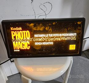 insegna luminosa e rendiresto KODAK