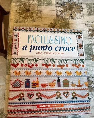 Raccoglitori con schemi punto croce